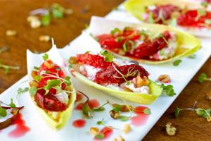 Endive stuffed with goat cheese, blood orange and walnuts